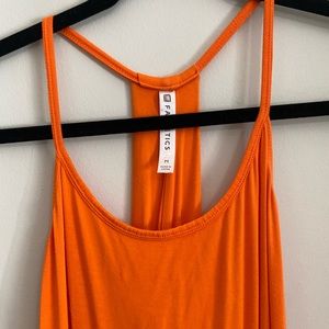 Orange Fabletics maxi dress.